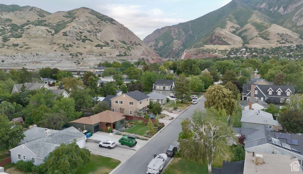 Aerial view of residential area with mountains