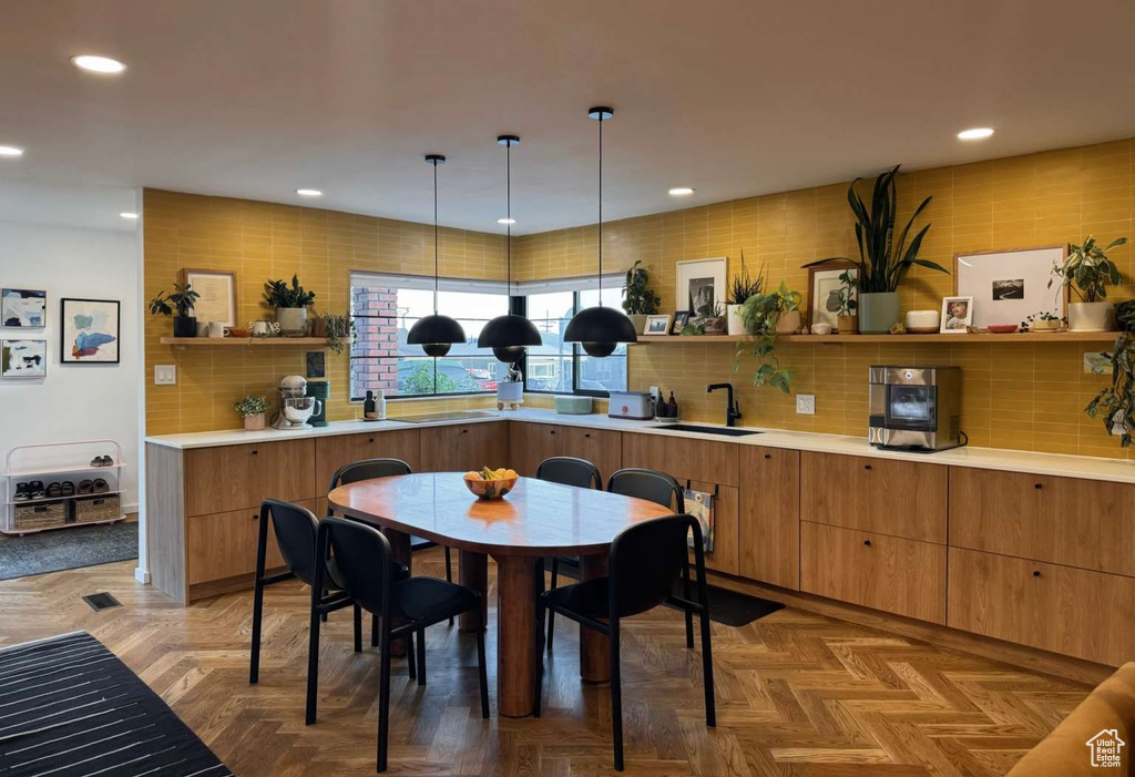 Dining space with recessed lighting