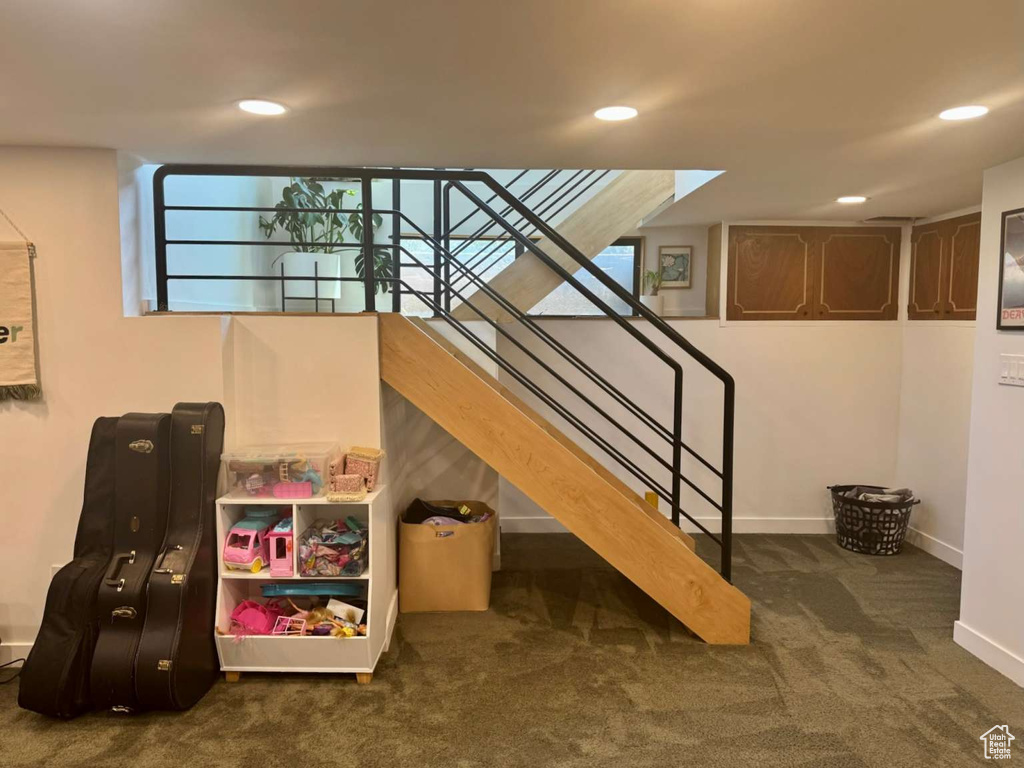 Stairs featuring carpet flooring and recessed lighting