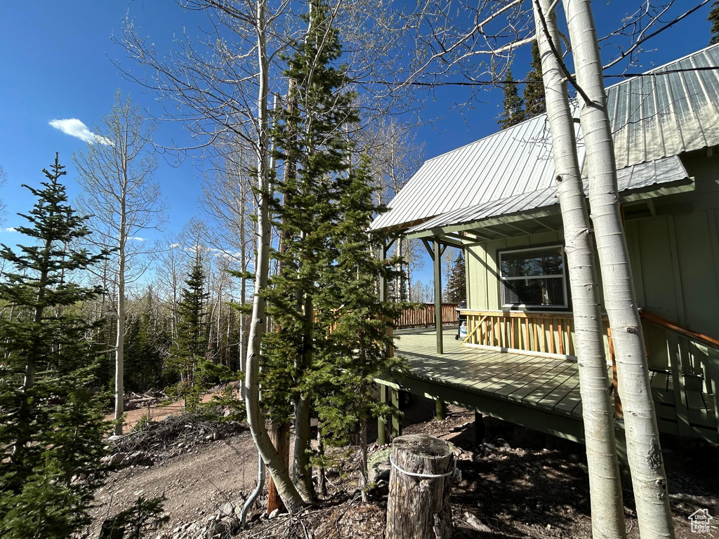View of yard with a deck