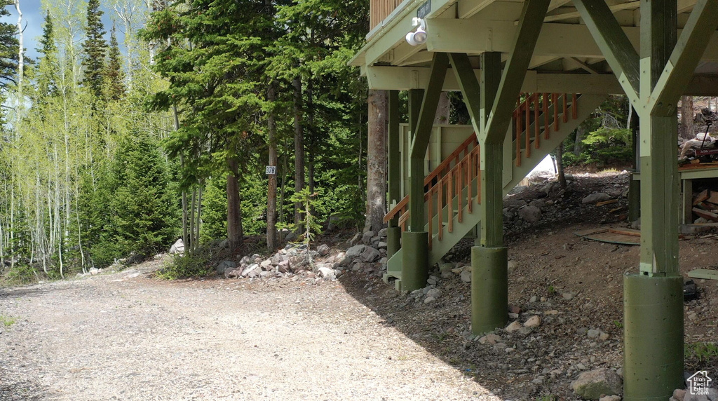 View of yard featuring stairs