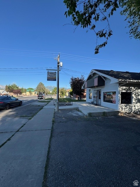 View of asphalt street with sidewalks