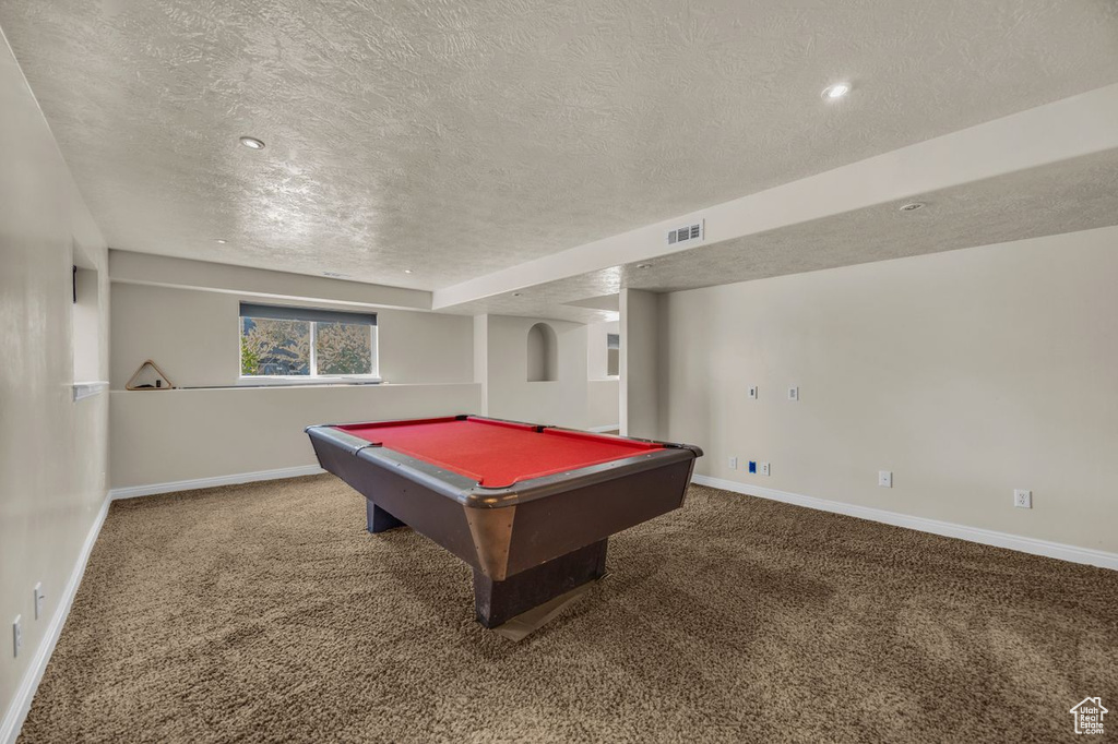 Rec room with a textured ceiling, carpet flooring, billiards, and recessed lighting