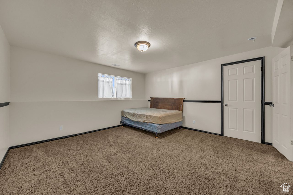 Bedroom featuring carpet floors