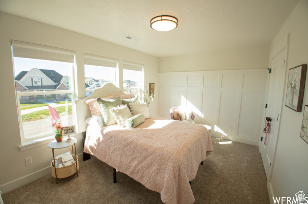 Bedroom featuring carpet flooring