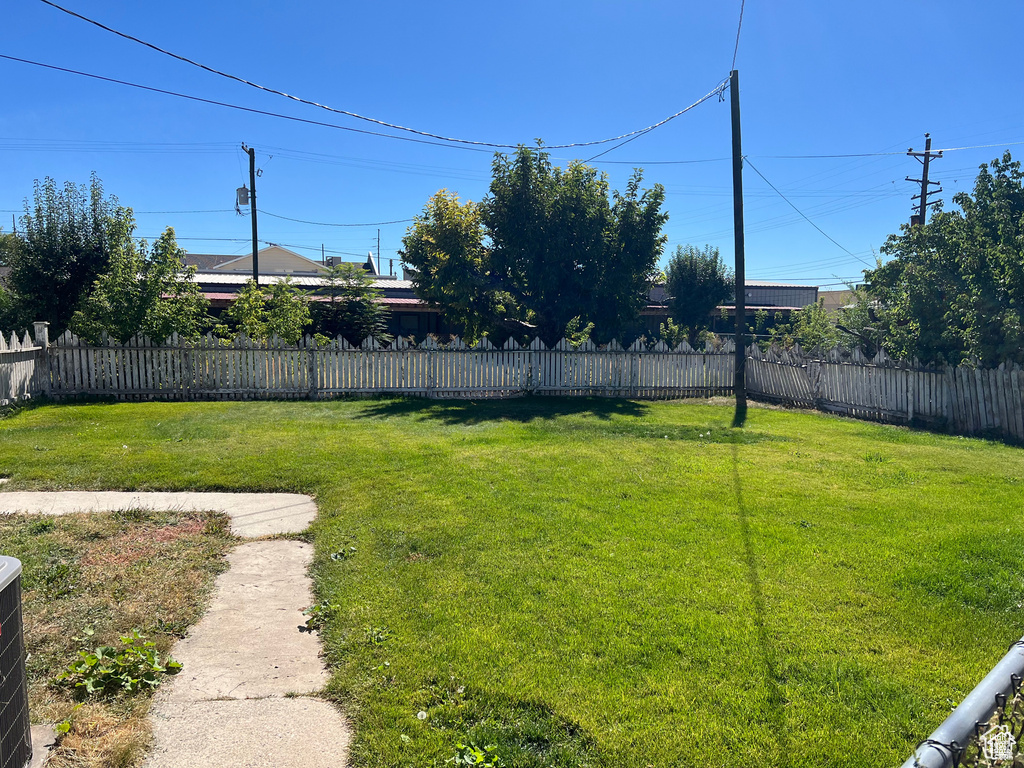View of fenced backyard