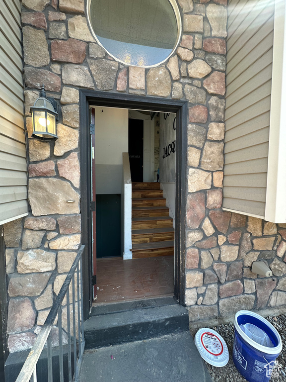 Property entrance with stone siding
