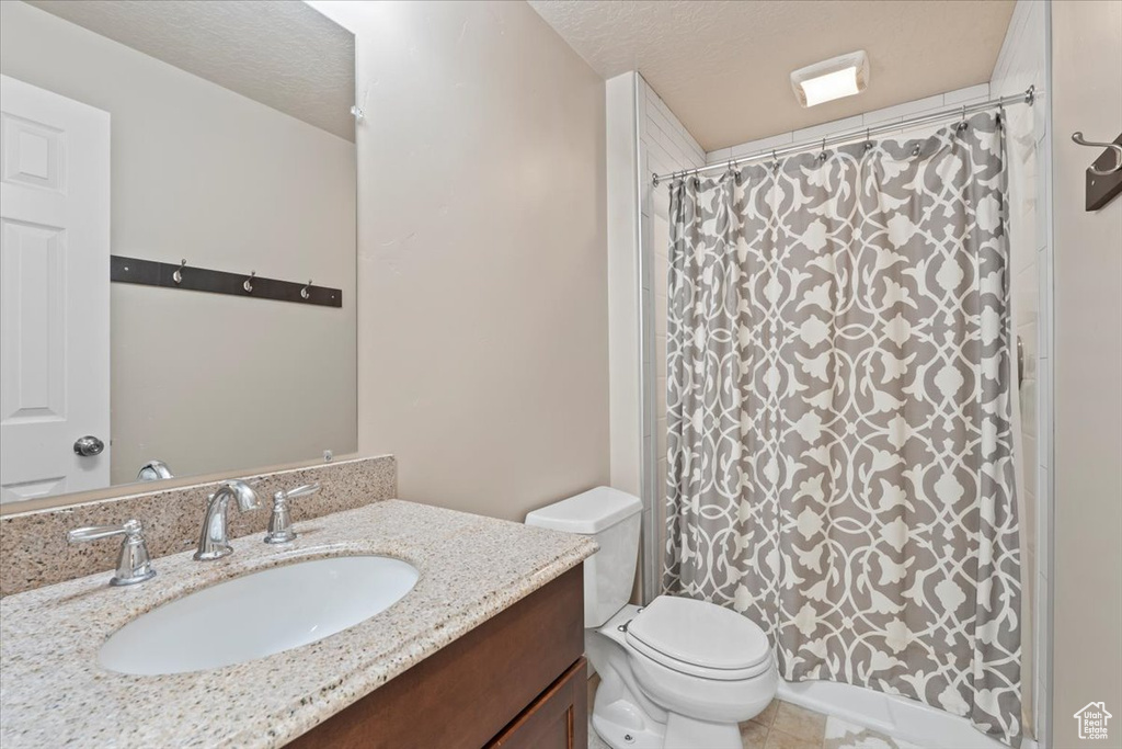 Bathroom with vanity and a shower with curtain