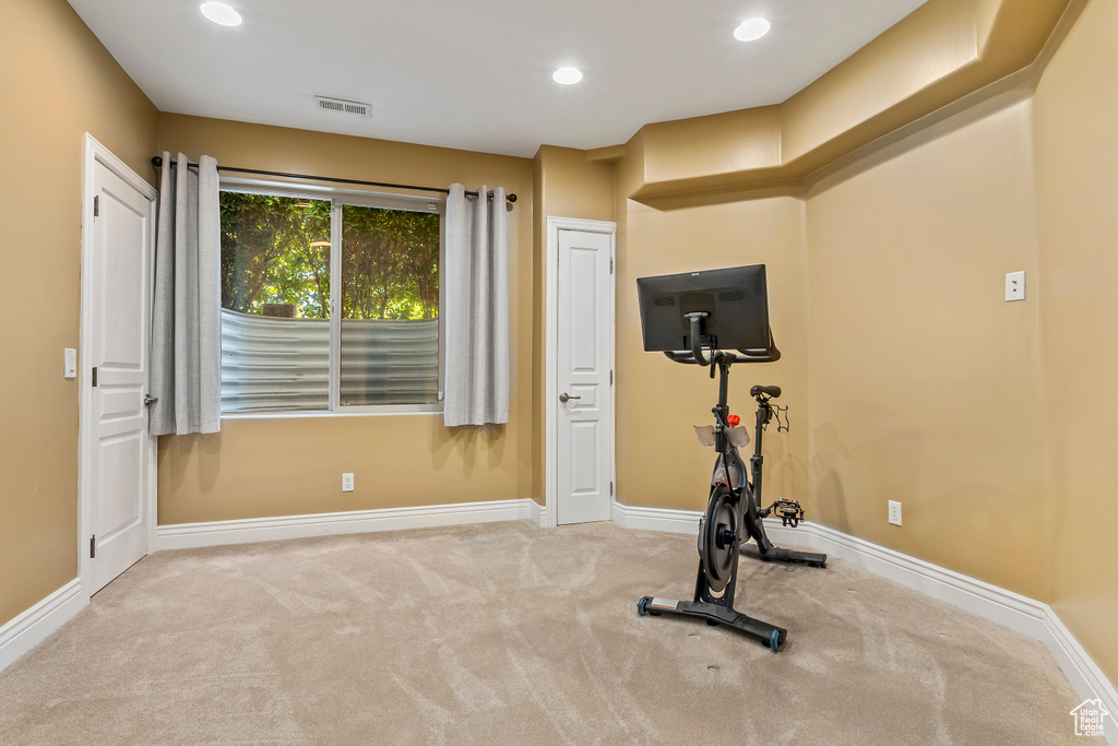 Workout room featuring carpet flooring and recessed lighting
