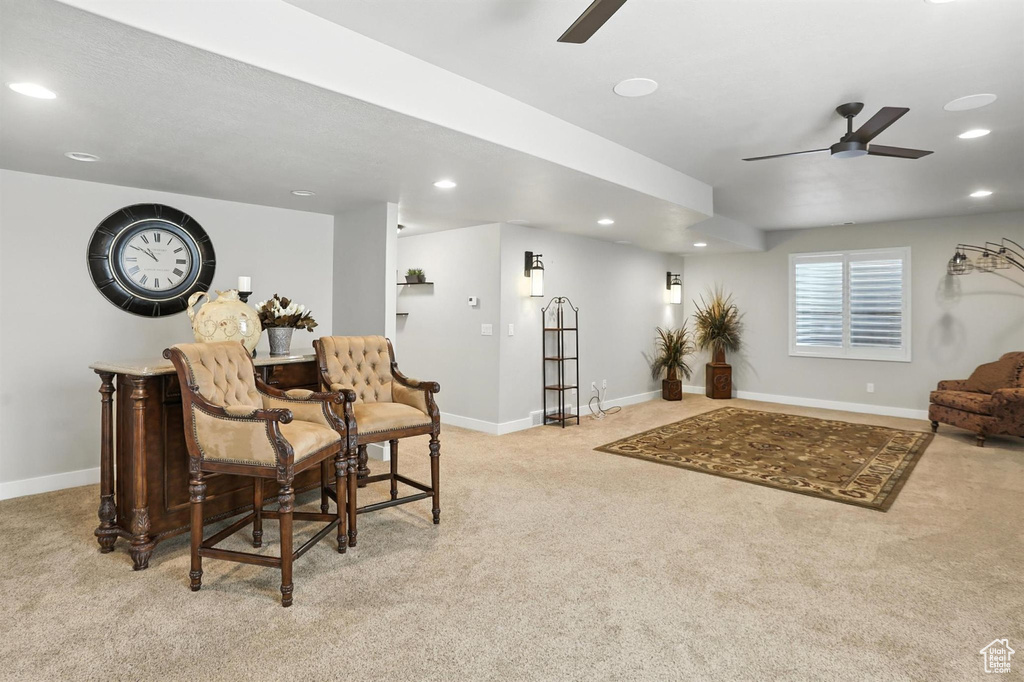Sitting room with a ceiling fan, carpet, and recessed lighting