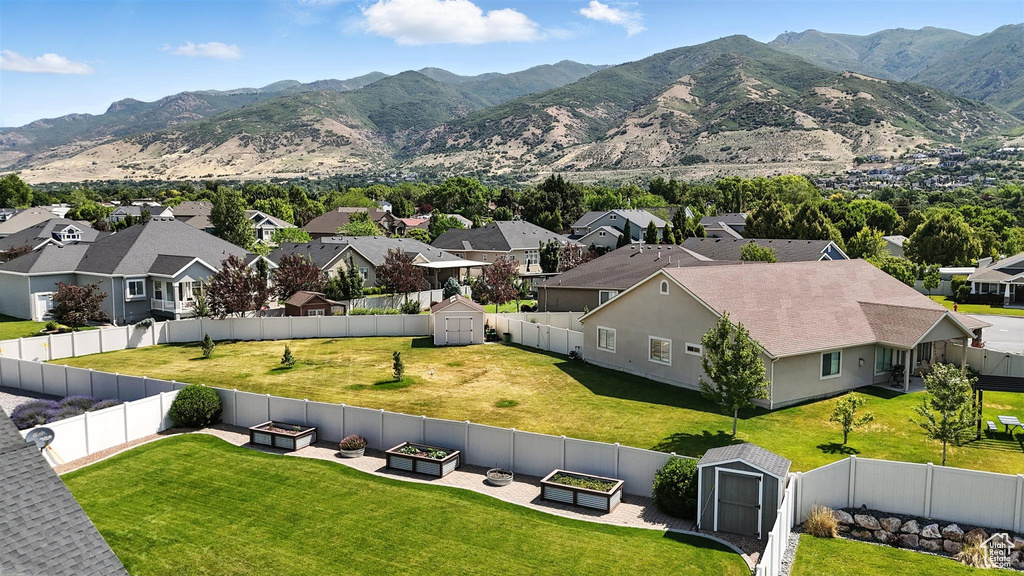 View of mountain backdrop with nearby suburban area