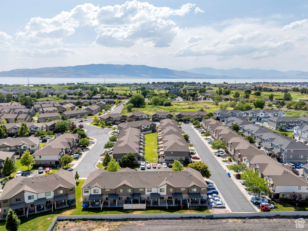 Aerial view of residential area featuring mountains