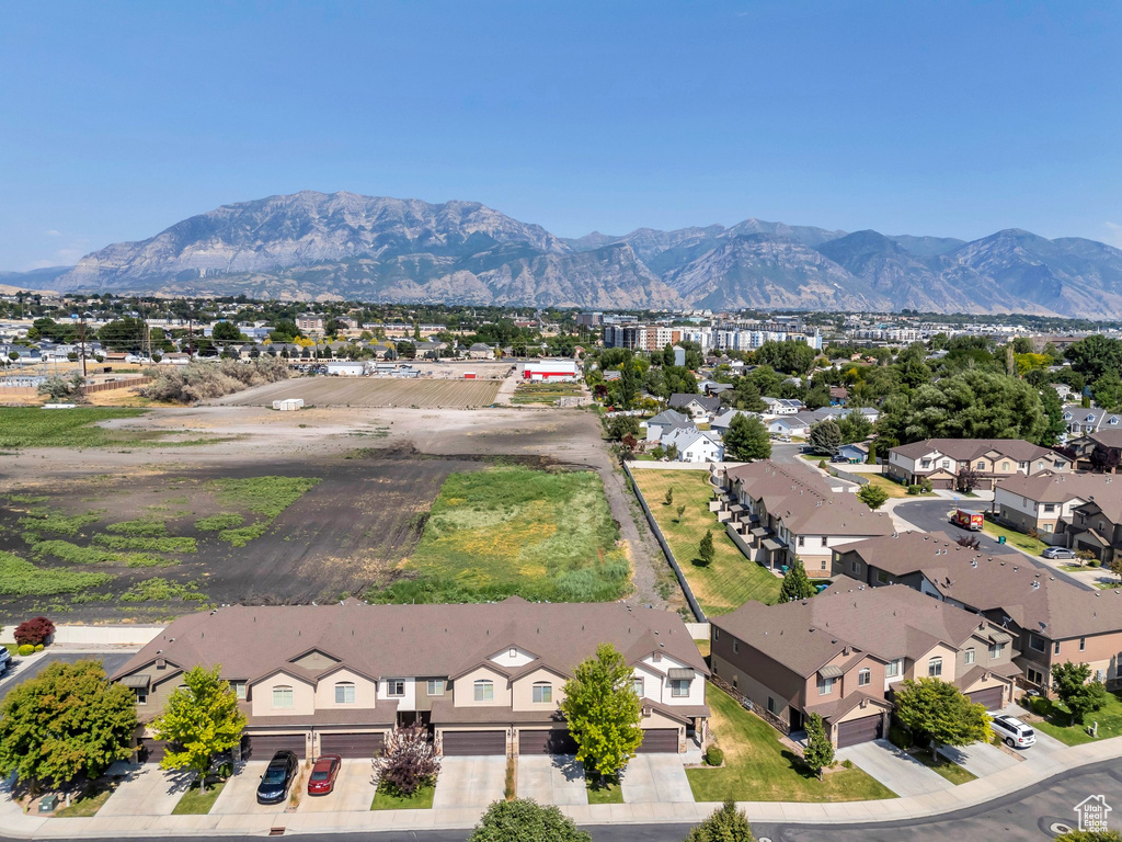 Aerial view of residential area with a mountain backdrop