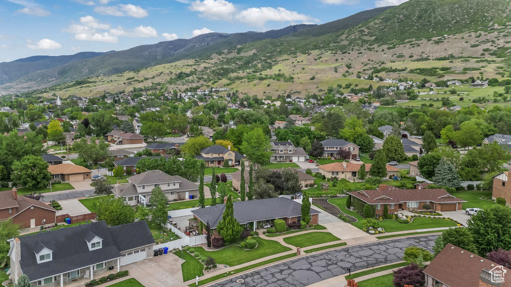 Aerial perspective of suburban area featuring mountains