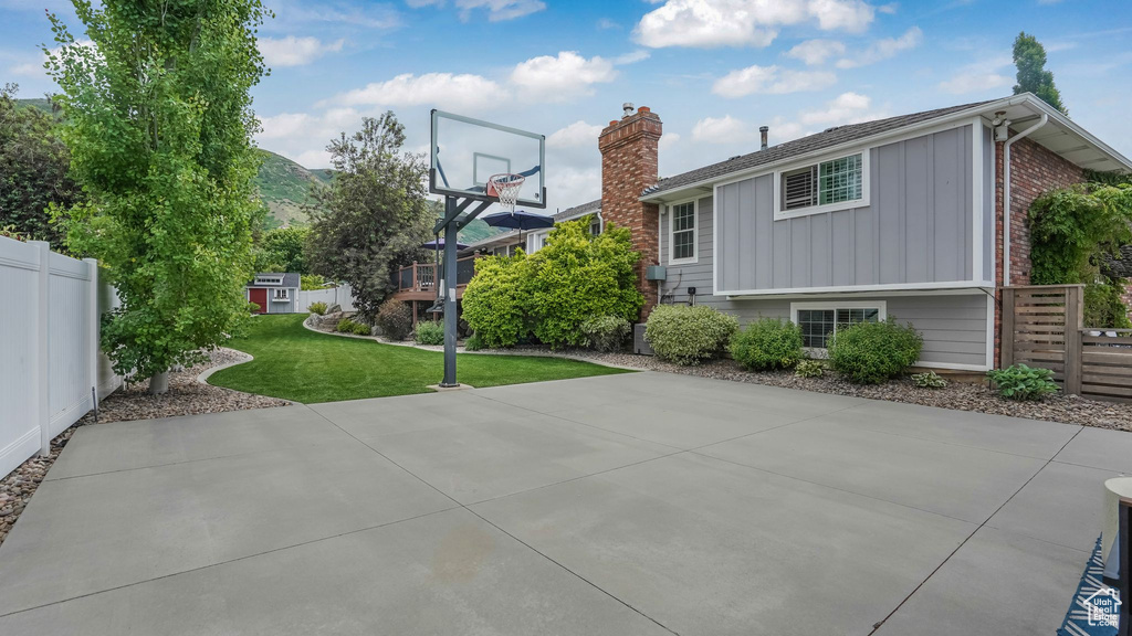 View of sport court featuring basketball court