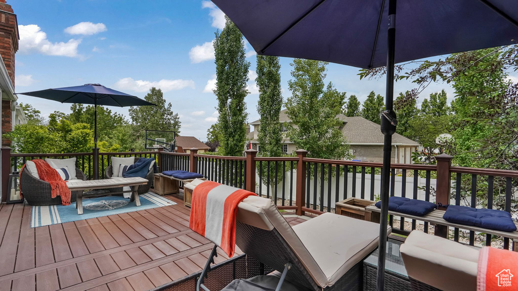 Wooden deck with an outdoor living space