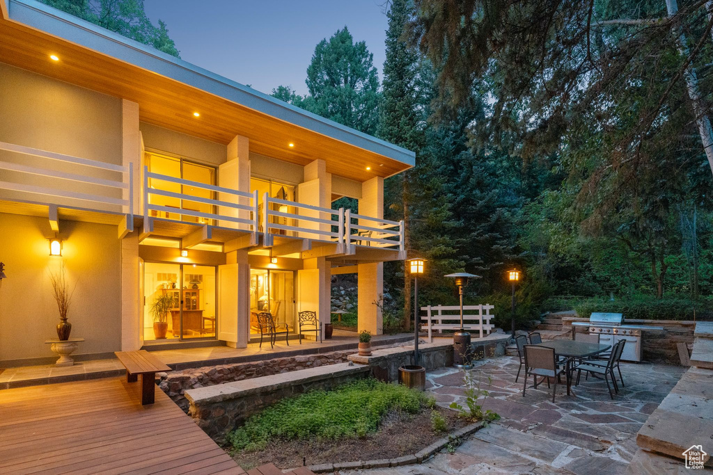 Patio / terrace featuring exterior kitchen, a patio area, and outdoor dining area
