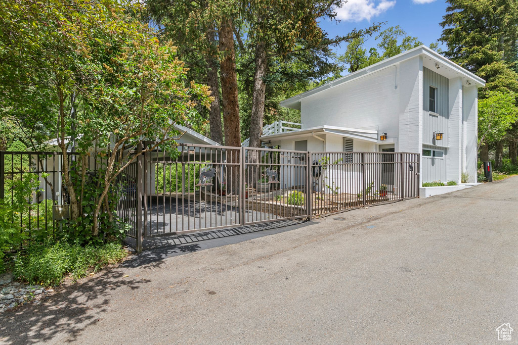 View of front of house featuring a gate