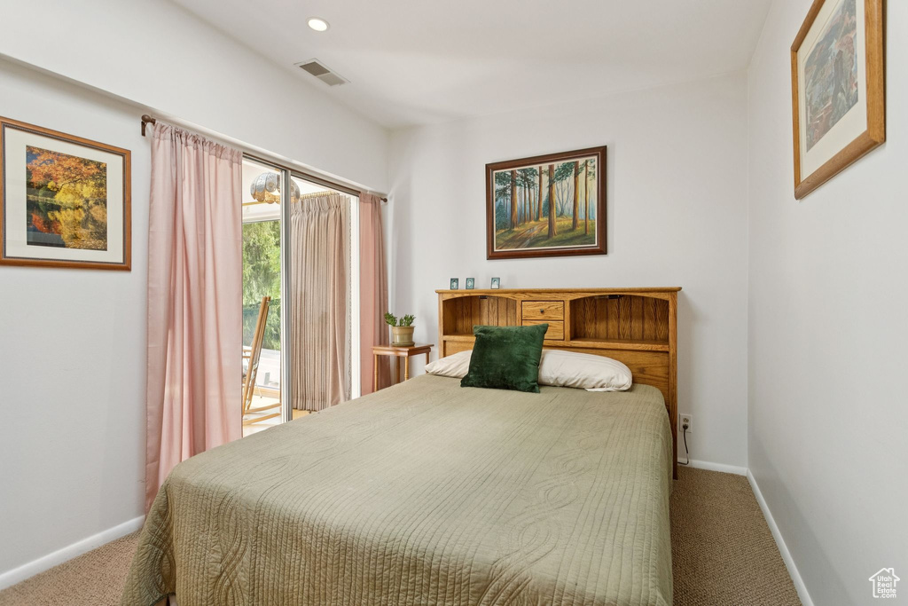 Carpeted bedroom with access to exterior and recessed lighting