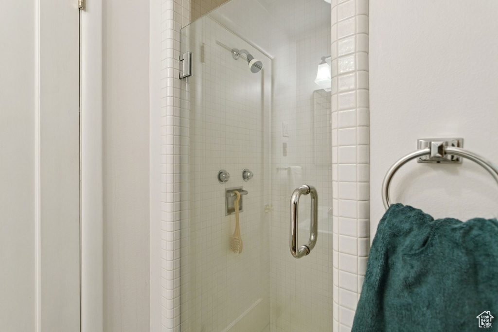 Full bathroom featuring a stall shower