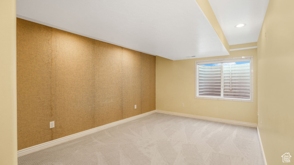Empty room with baseboards and carpet flooring