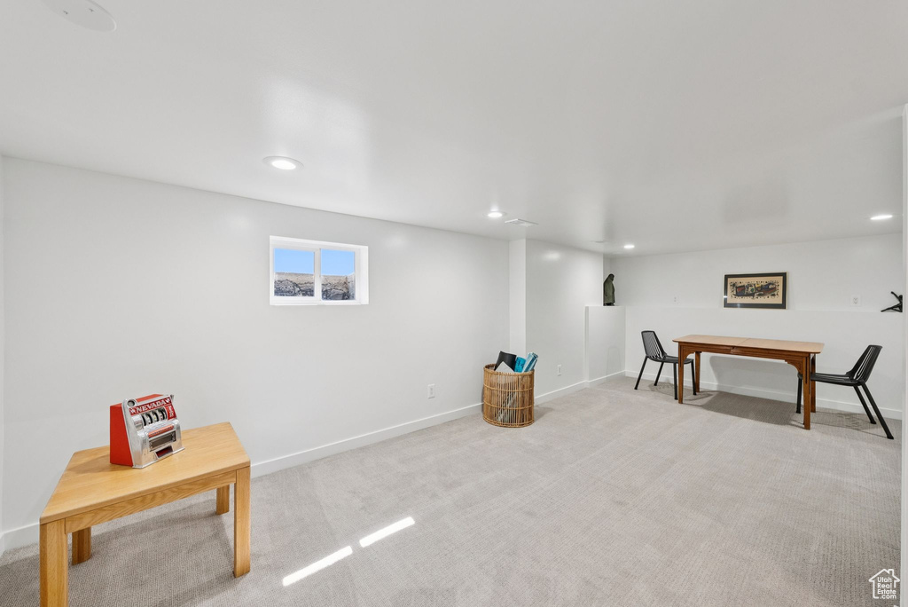 Below grade area with recessed lighting and carpet flooring