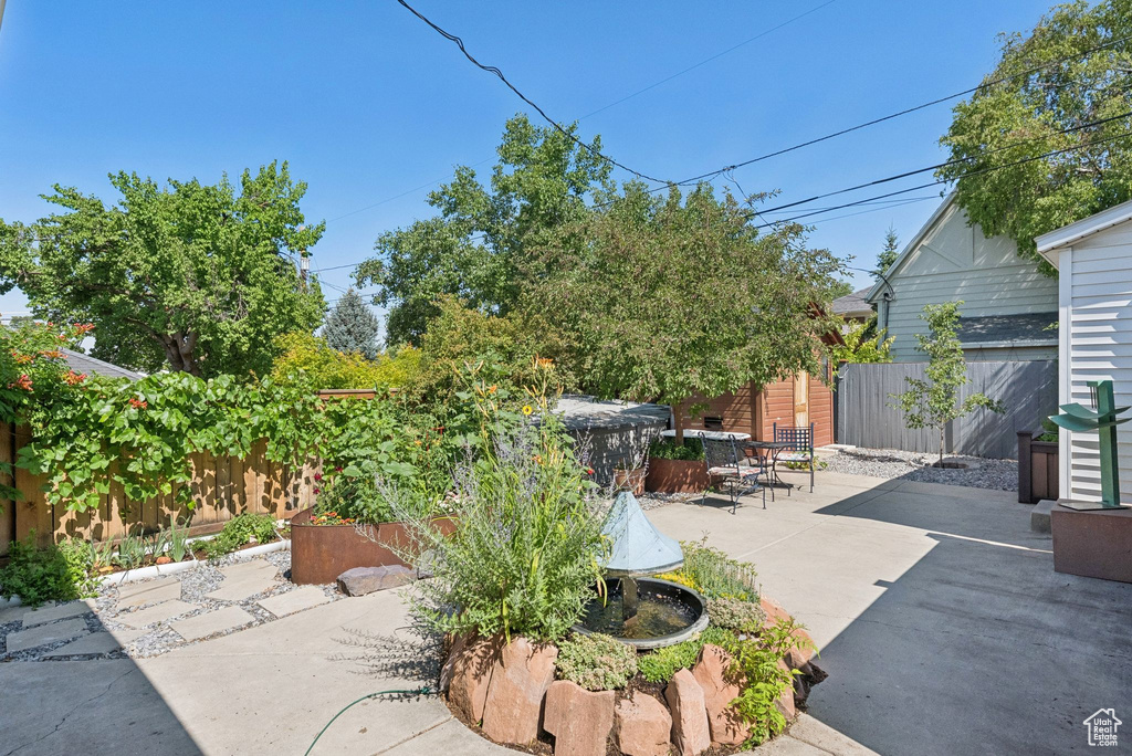 Fenced backyard featuring a patio area