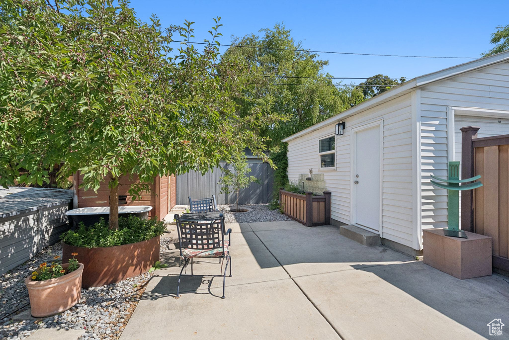 View of patio / terrace with an outbuilding