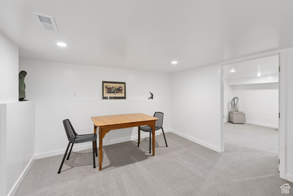 Carpeted office with recessed lighting