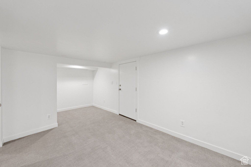 Finished below grade area with carpet and recessed lighting