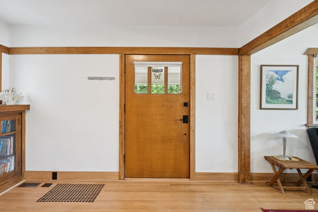 Entryway featuring wood finished floors