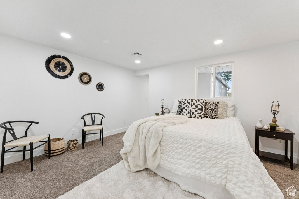 Carpeted bedroom featuring recessed lighting