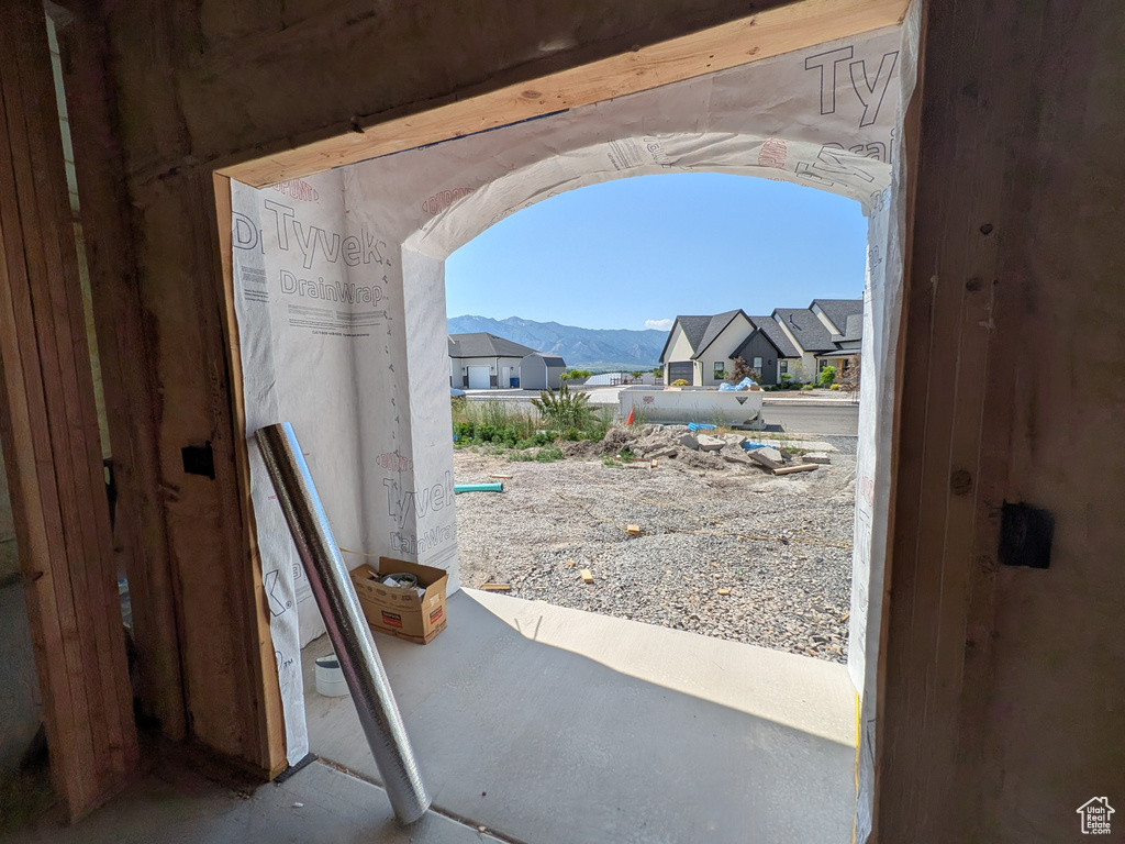 Doorway to outside with a mountain view