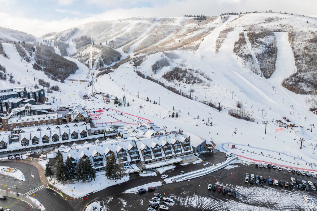 Snowy aerial view with a mountain view