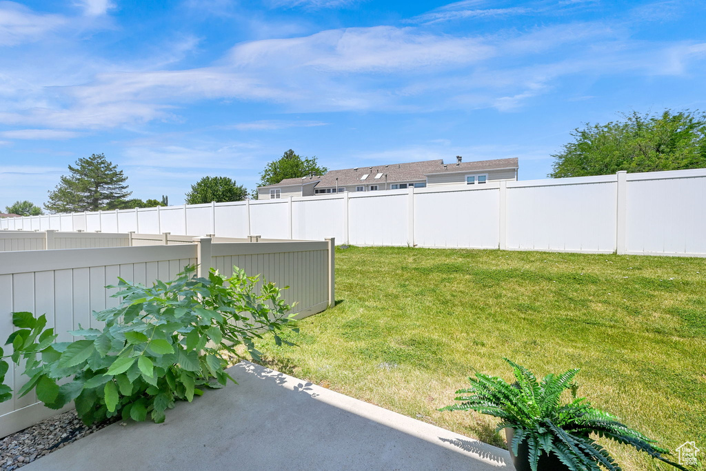 View of fenced backyard