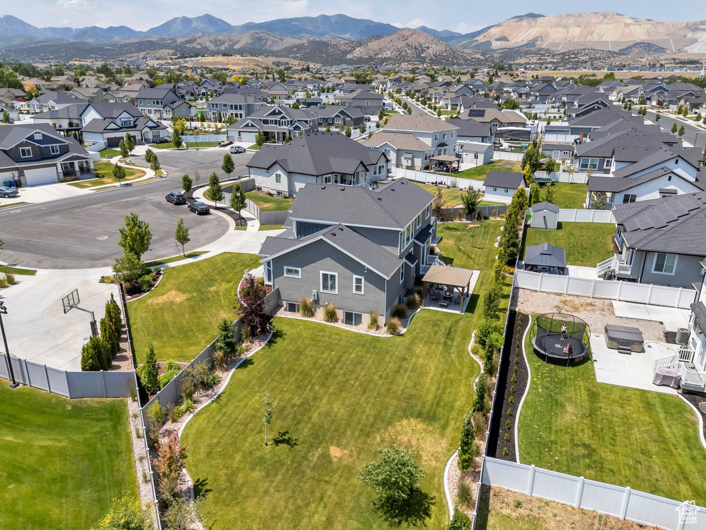Aerial perspective of suburban area with mountains