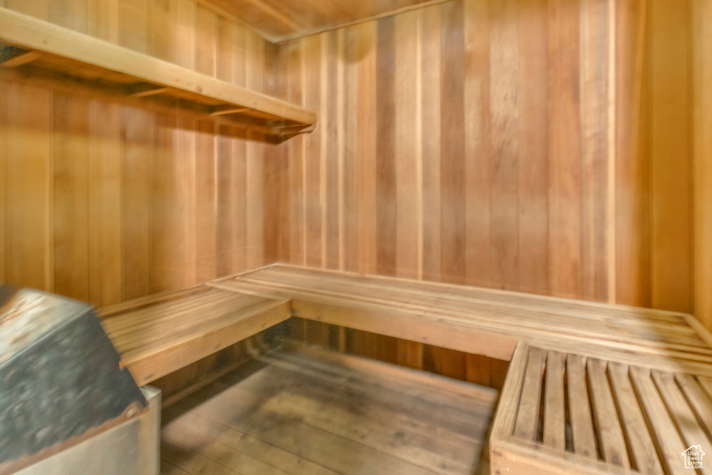 Relaxing sauna featuring wood walls