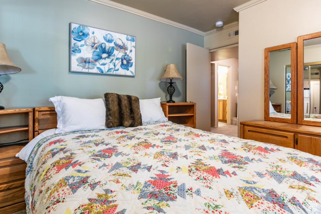 Bedroom with ornamental molding