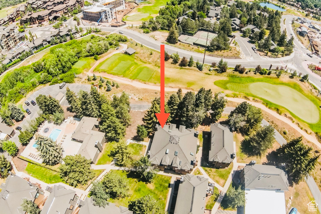Aerial perspective of suburban area with a golf course