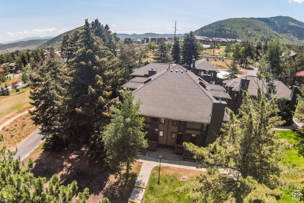 View of subject property featuring a mountain backdrop