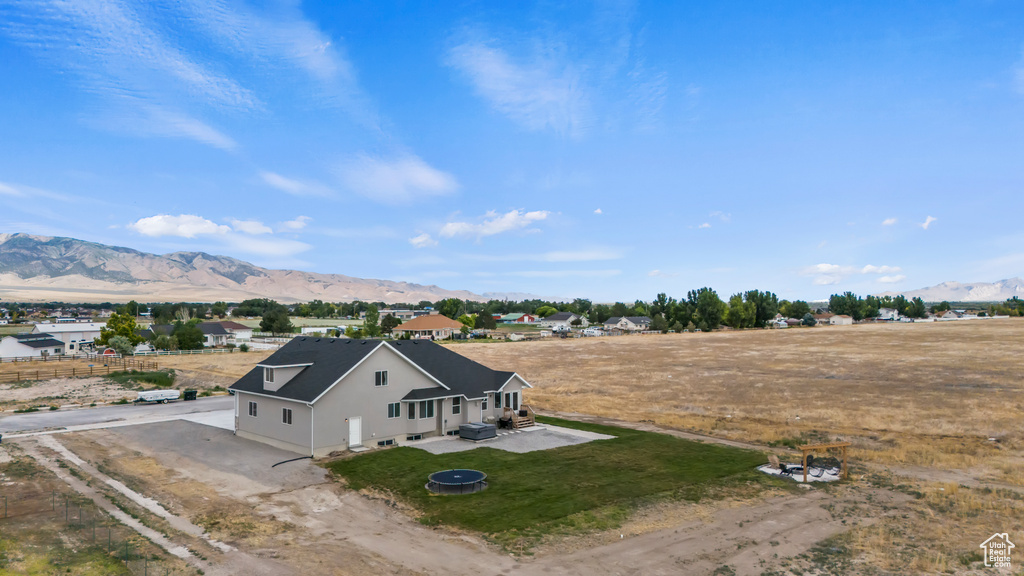 View of subject property with a mountainous background