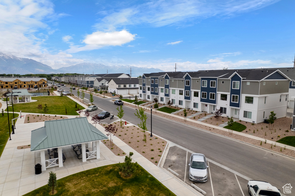 Aerial perspective of suburban area with a mountain backdrop