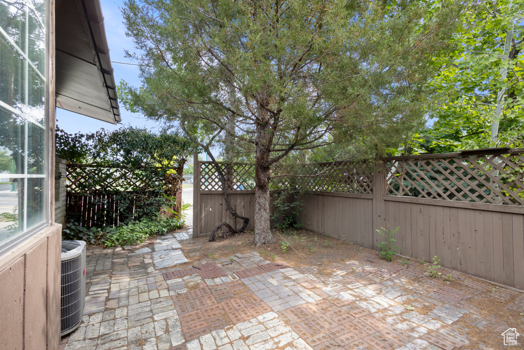 Fenced backyard featuring a patio area
