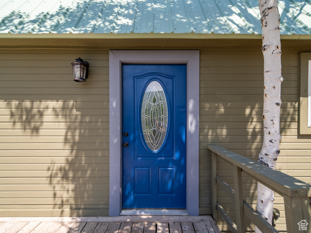 Property entrance with a metal roof