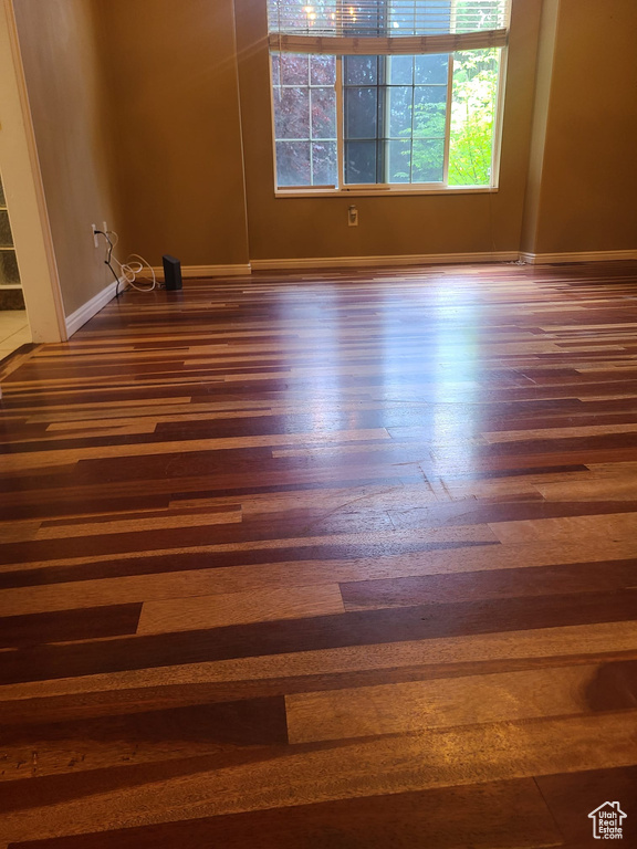 Unfurnished room featuring wood finished floors