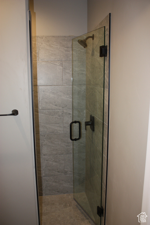 Bathroom featuring a shower stall