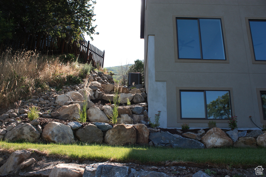 View of side of property with stucco siding