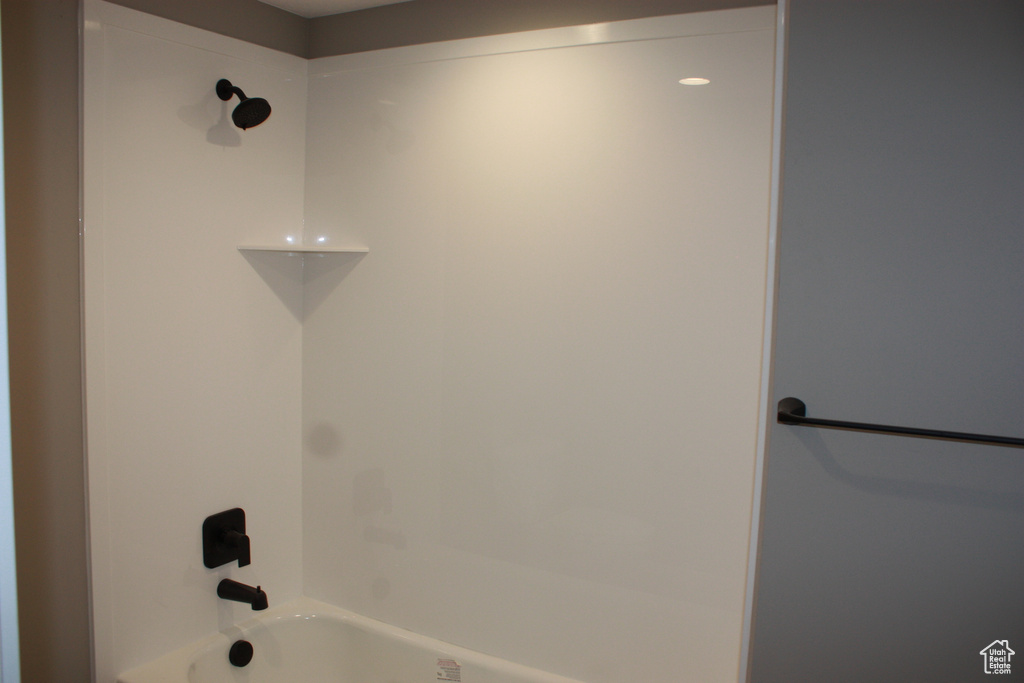 Full bathroom with shower / washtub combination