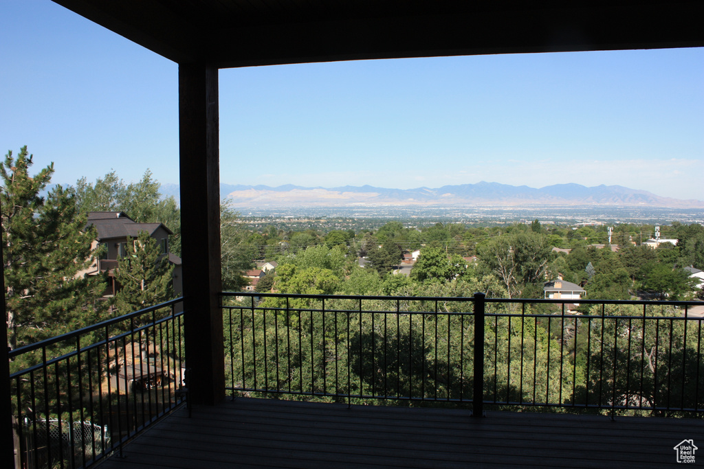 Wooden deck featuring a mountain view