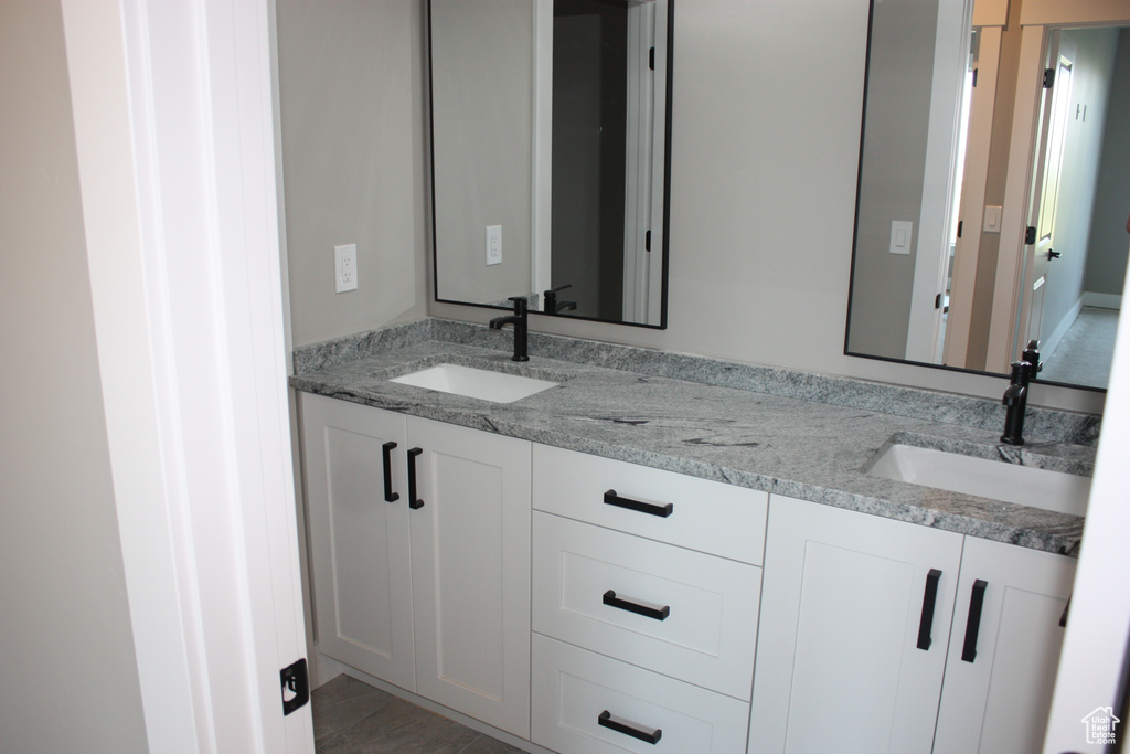 Full bathroom with double vanity
